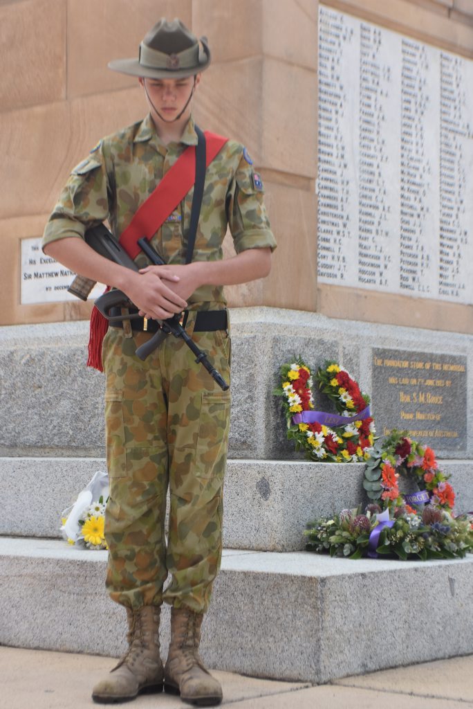 Jack O'Dea, of the Warwick Army Cadet unit, rests on arms reversed as part of the catafalque party at the Warwick war memorial, Anzac Day 2016.